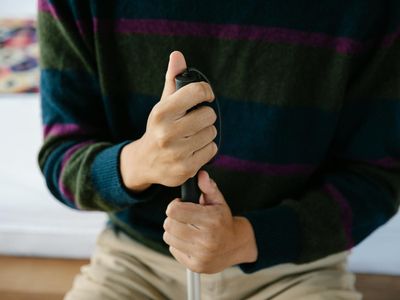 Detail of hands in a balancing position.