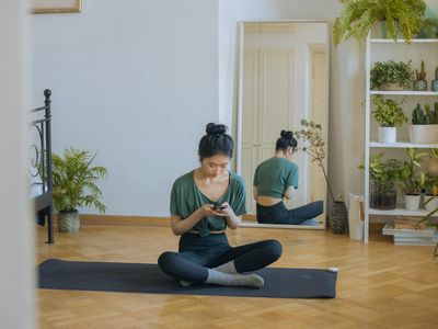 Minimalist exercise space with a plant.