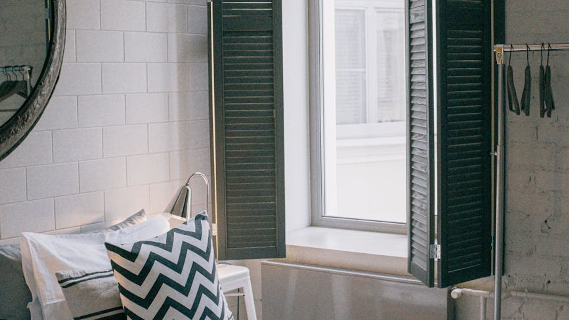 Serene yoga studio with natural light and minimalist wooden interior design.